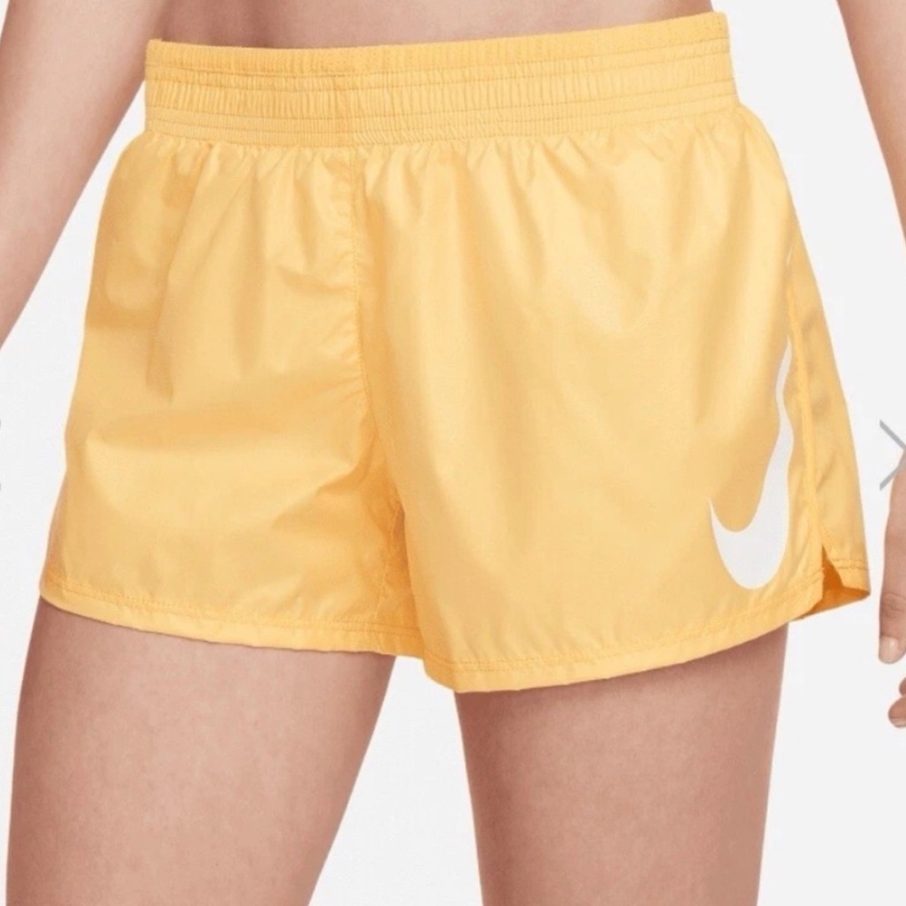 Nike Women’s Light Yellow Running Shorts with White Swoosh